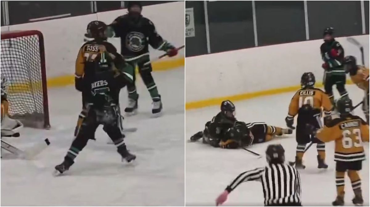 Un joven jugador de hockey es apartado tras un incidente en el campo de juego.